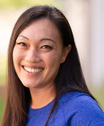 Portrait of Dr. Cindy Oania, owner and physical therapist at Action Rehab Physical Therapy