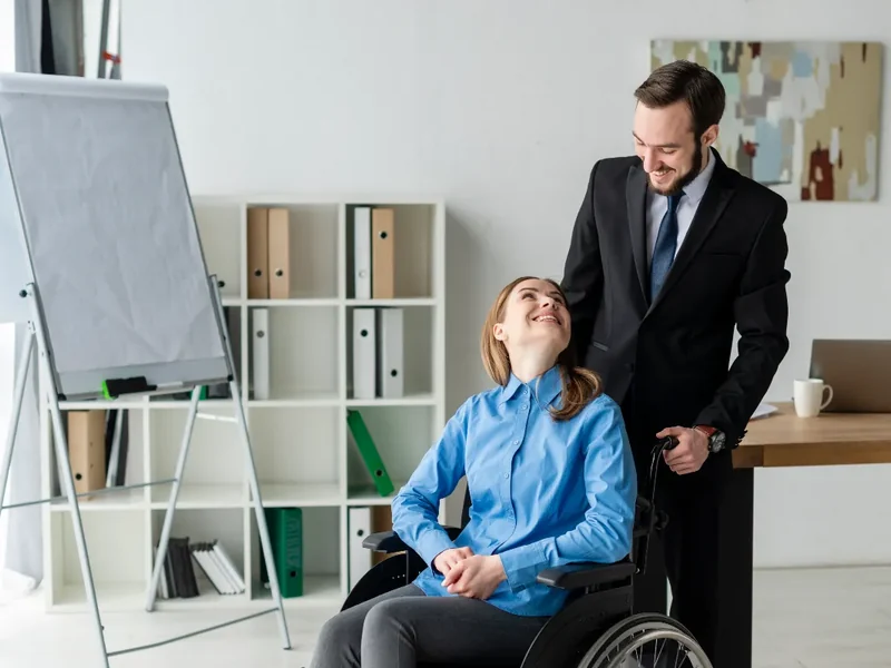 licensed physical therapist working one-on-one with a patient recovering from a work injury