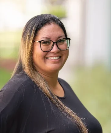 Portrait of Tania Yuen-Carvalho, Office Manager at Action Rehab Physical Therapy